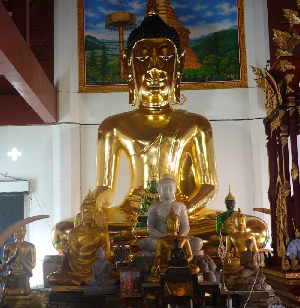 Large gold Buddha statue in the viharn at Wat Jed Lin, Chiang Mai, Thailand
