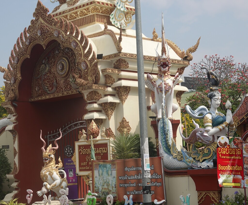 Water nymph and Singha at entrance to Wat Muen Toom, Chiang Mai, Thailand