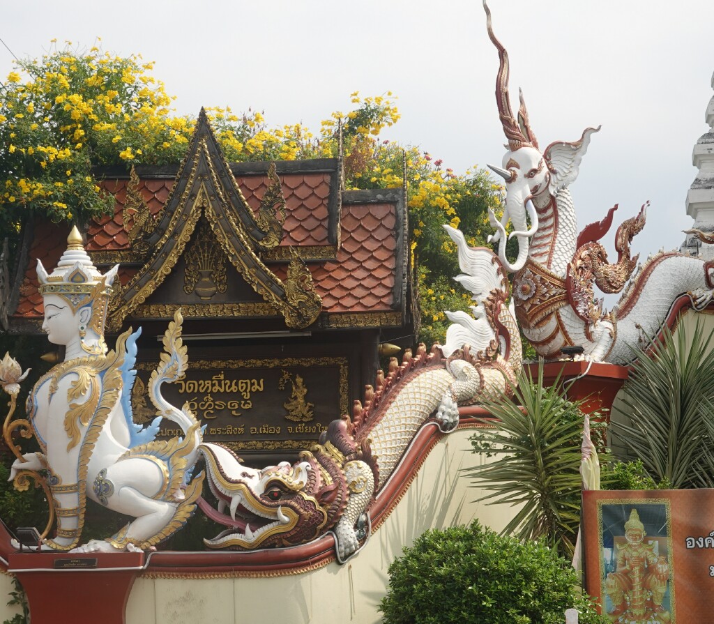 Singha and water naga at entrance to Wat Muen Toom, Chiang Mai, Thailand